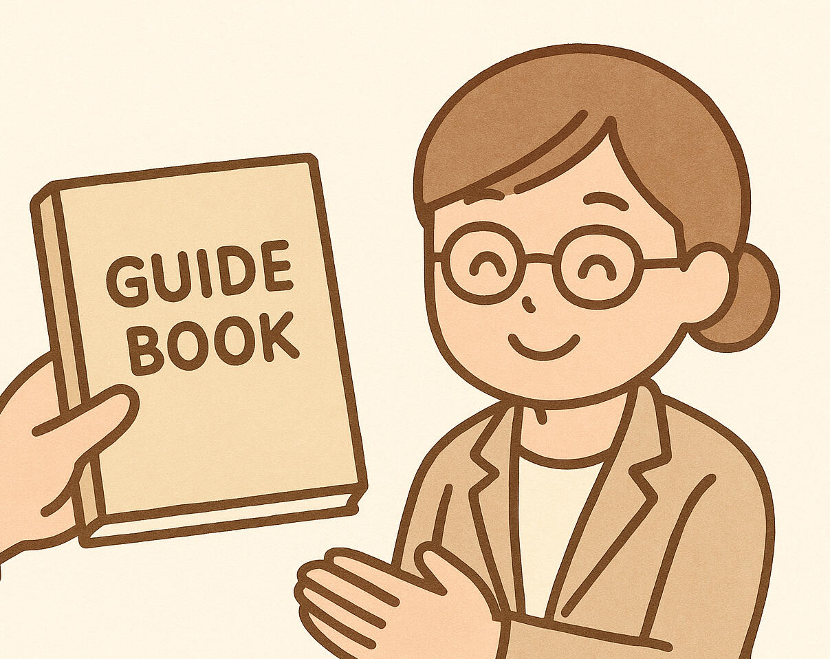 A grateful staff member receiving a guide book.